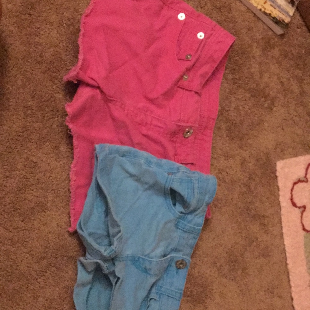 Cute summery blue and pick jean shorts.